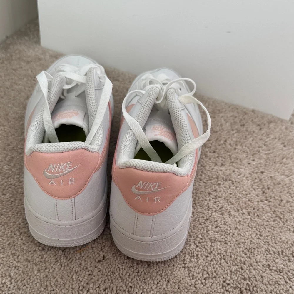 Nike White Leather Low-Top Sneakers with Pink Swoosh